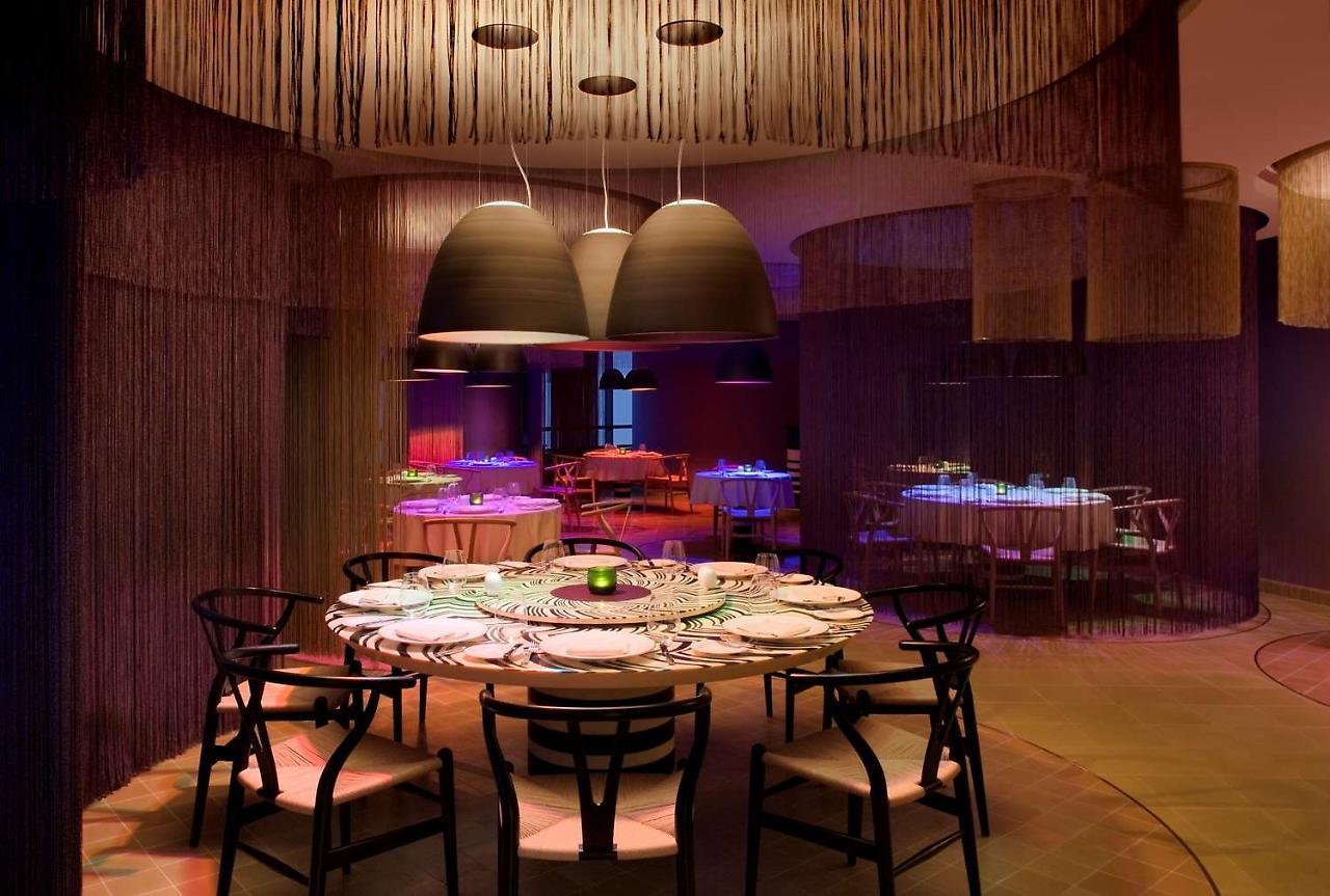 Symphony Style Hotel Kuwait Salmiya Restoran fotoğraf The interior of the restaurant