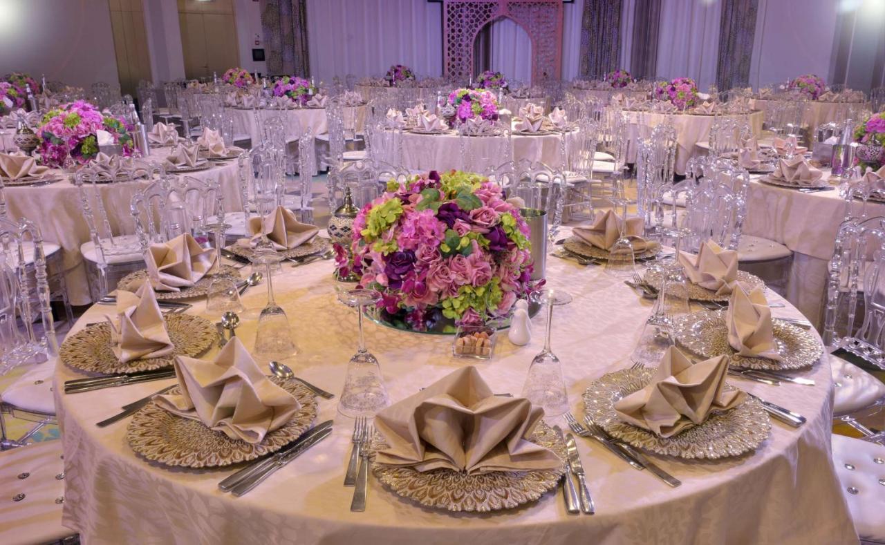 Symphony Style Hotel Kuwait Salmiya Dış mekan fotoğraf A table set for a formal dinner