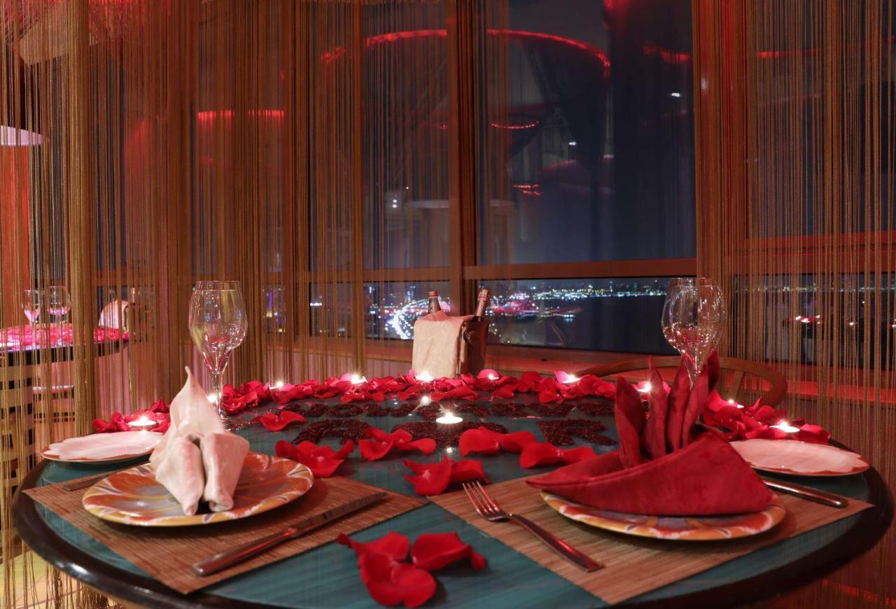 Symphony Style Hotel Kuwait Salmiya Dış mekan fotoğraf A table set for a romantic dinner
